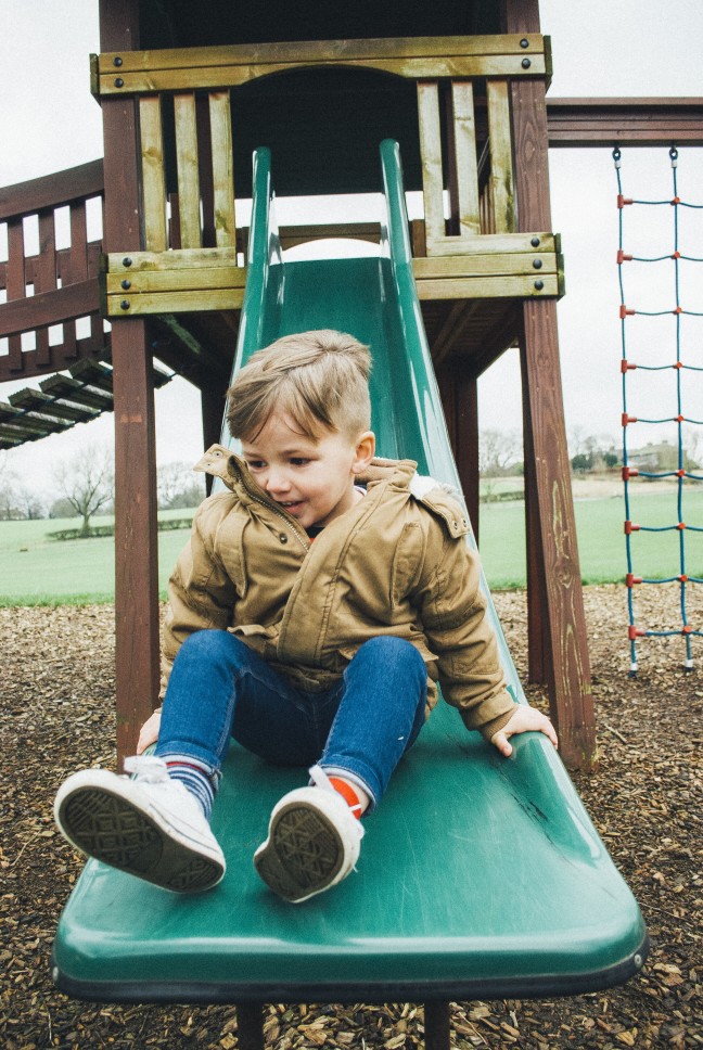 Toddler playing in a park